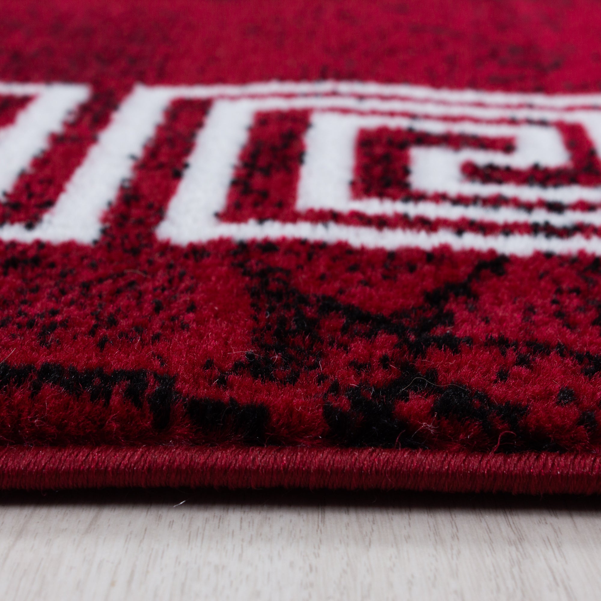 Kurzflor Design Teppich Griechisches Ornament Muster Troja Rot Schwarz Meliert
