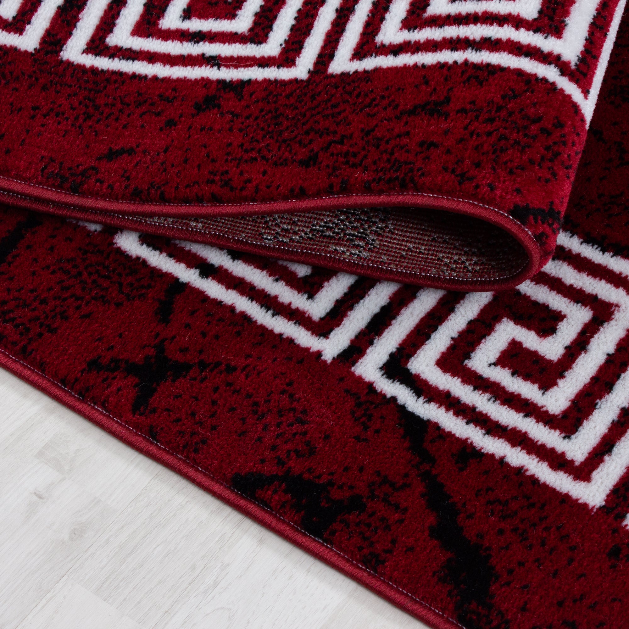 Kurzflor Design Teppich Griechisches Ornament Muster Troja Rot Schwarz Meliert