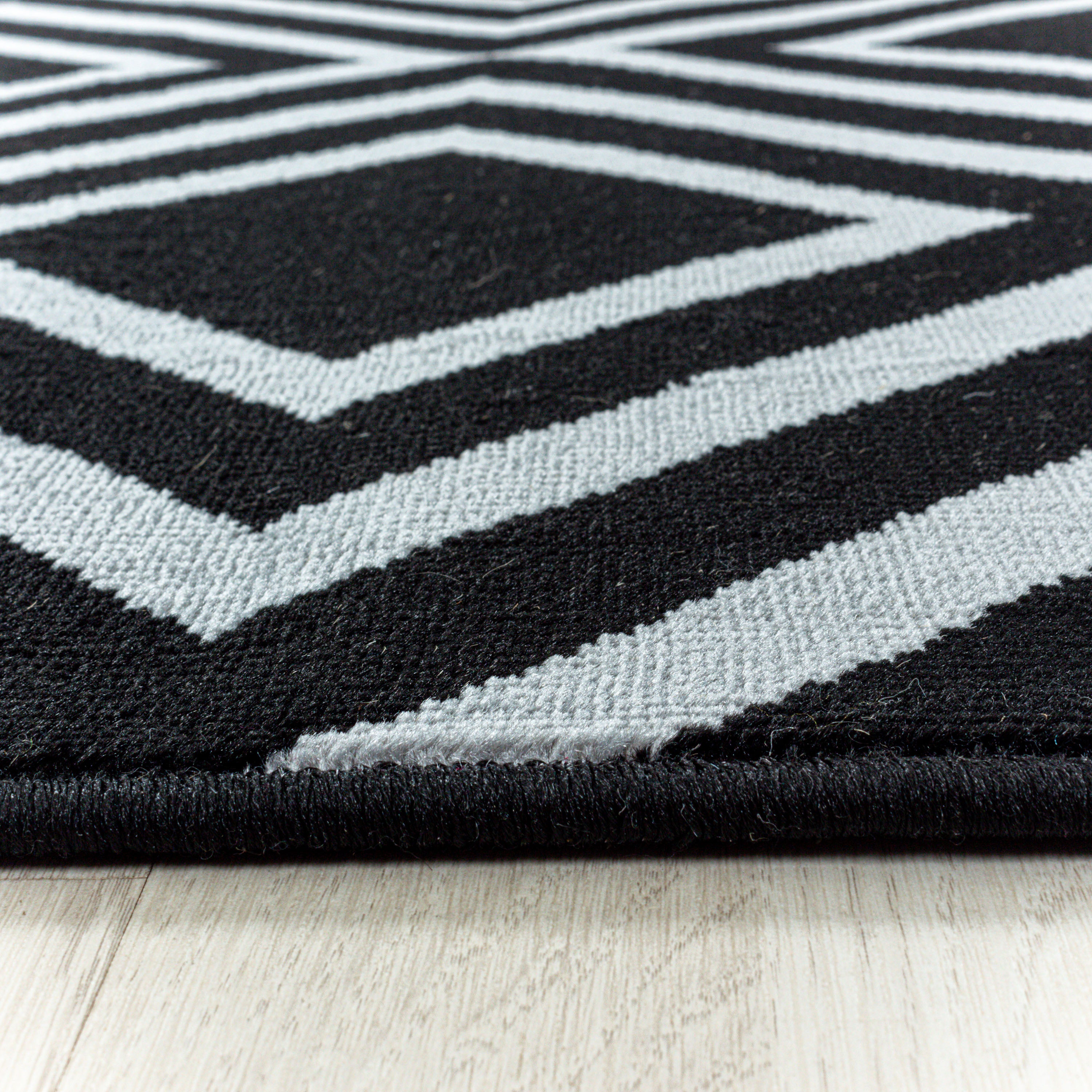Weicher Kurzflor Teppich Wohnzimmerteppich Rauten Gitter Design Schwarz
