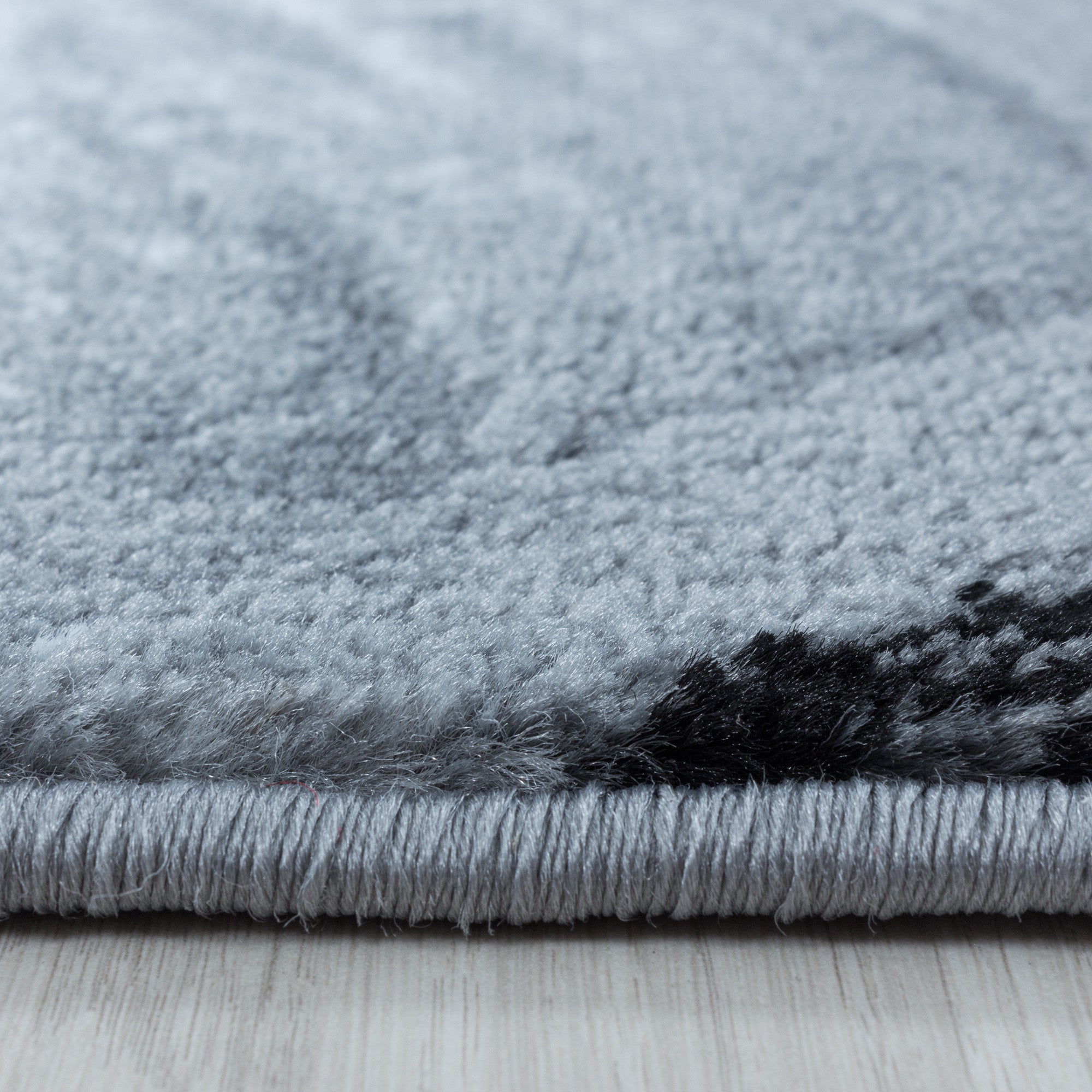 Weicher Kurzflor Teppich Wohnzimmerteppich Rundes Gitter Design Schwarz