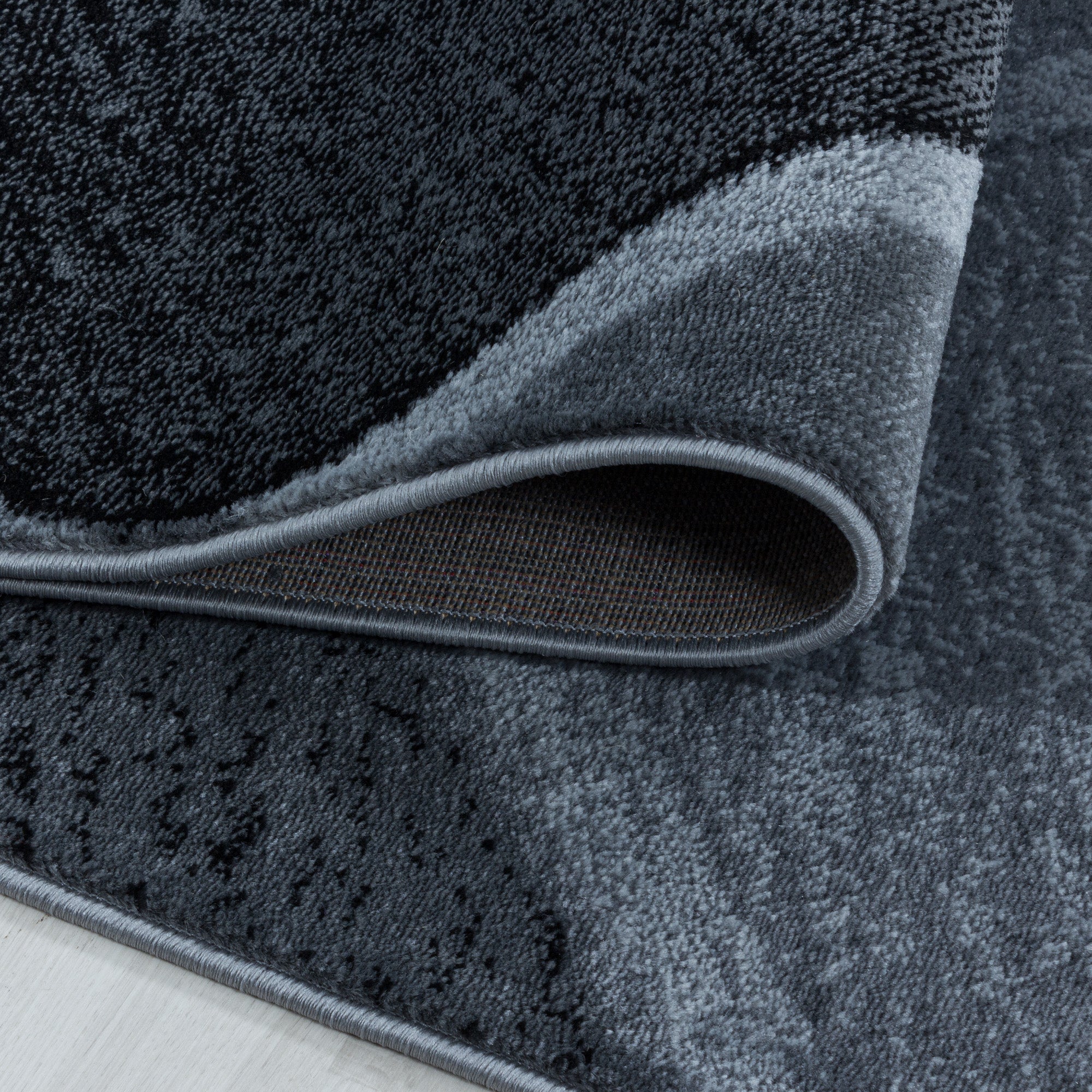 Weicher Kurzflor Teppich Wohnzimmerteppich Rundes Gitter Design Schwarz