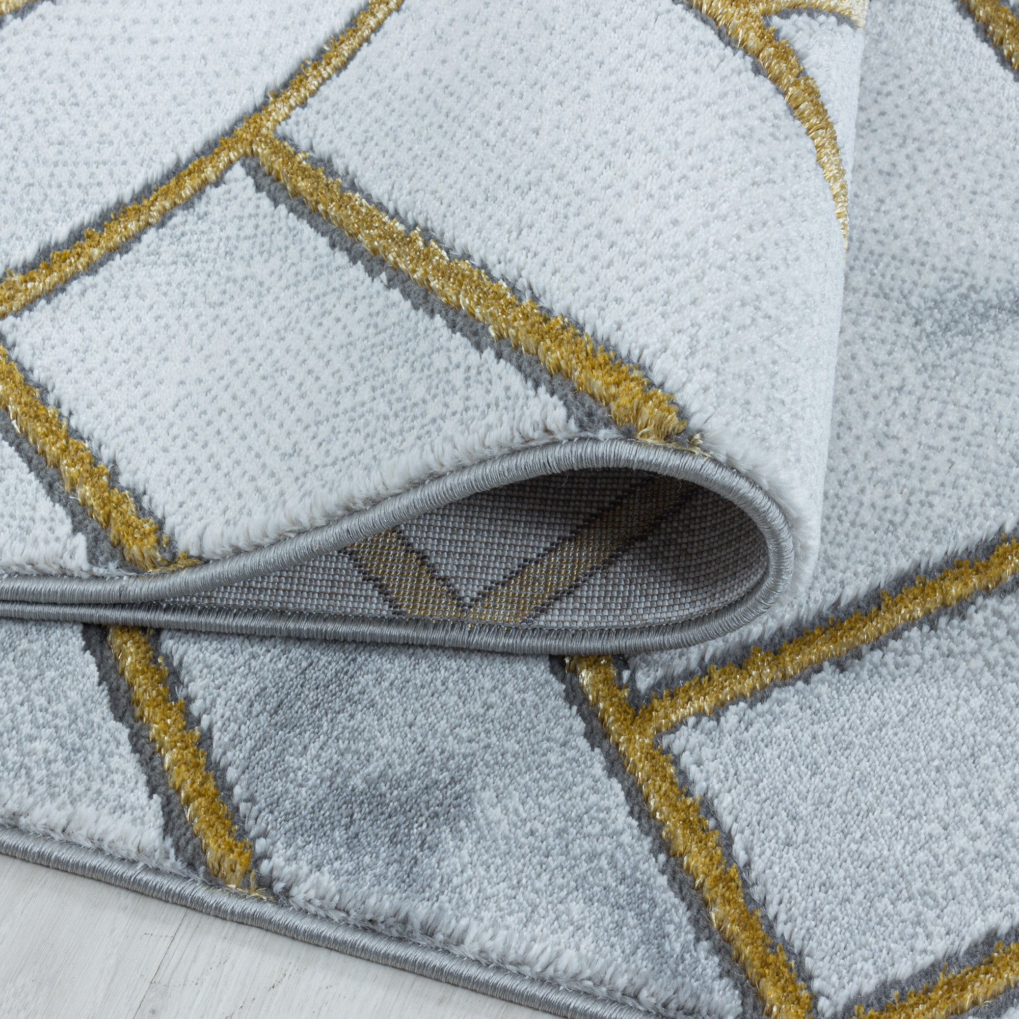 Kurzflor Design Teppich Wohnzimmerteppich Muster Marmoriert Linien Karo Gold